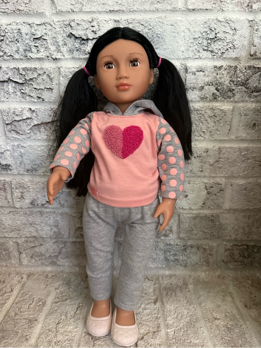 Our Generation Doll and outfits. Never played with. Comes with several outfits